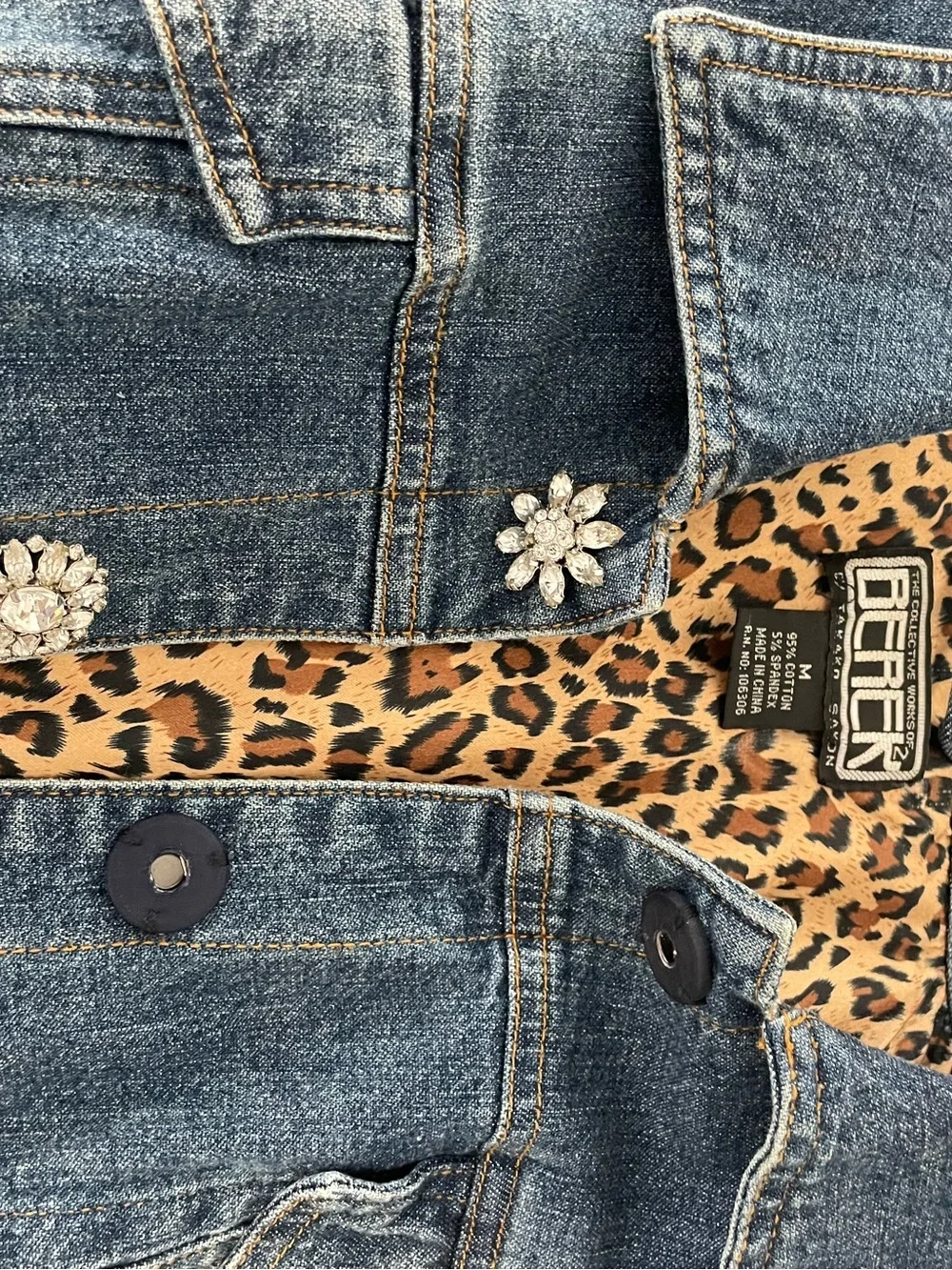 Berek Denim Jacket with leopard print facing at collar & cuffs.